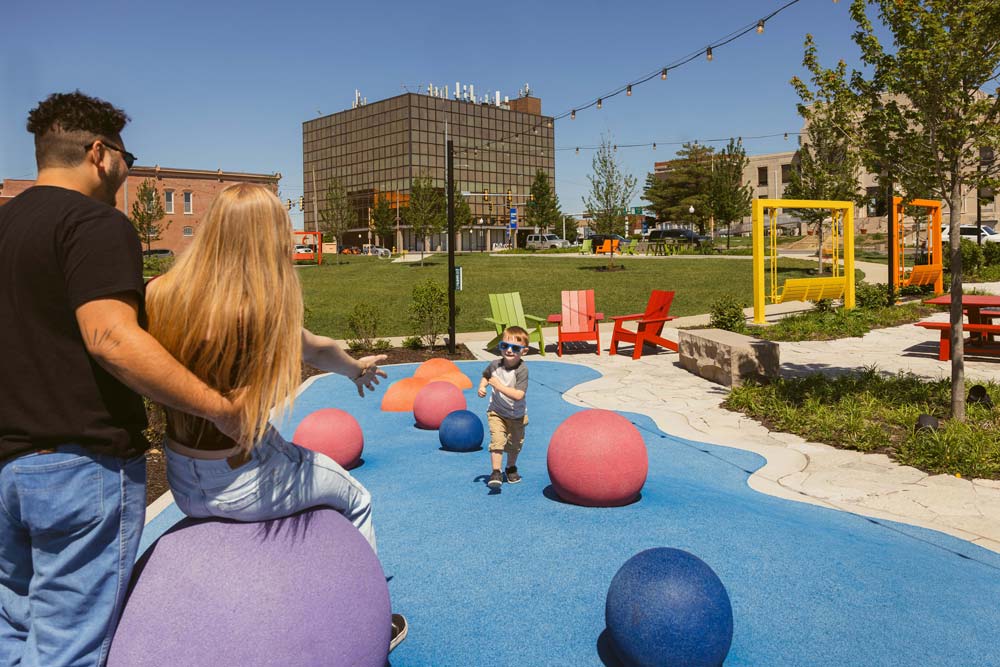 Family Playing at The Commons