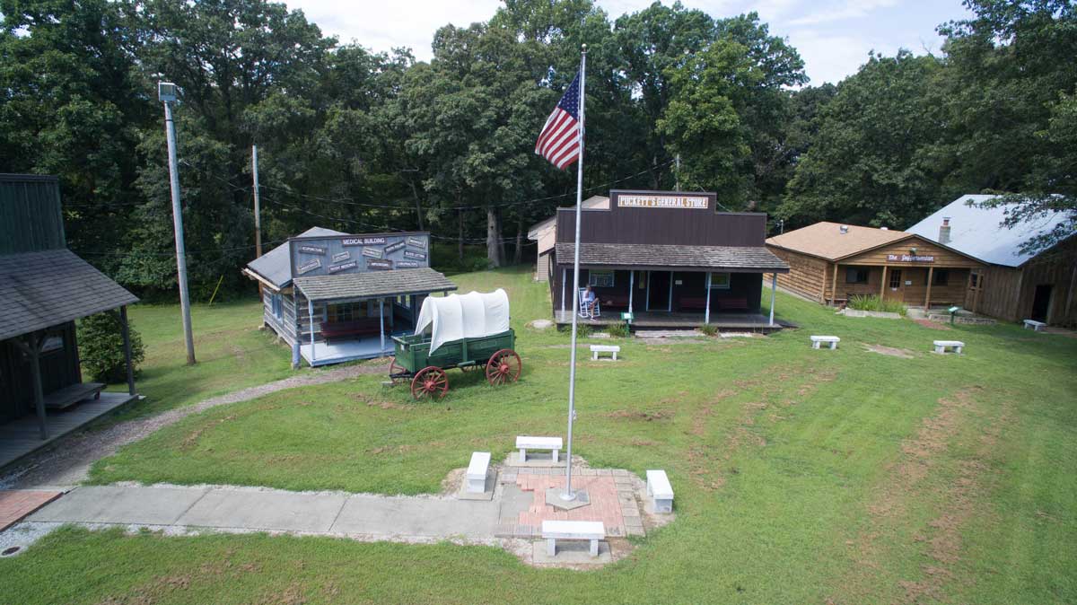 Historic Reenactment Village with Covered Wagon